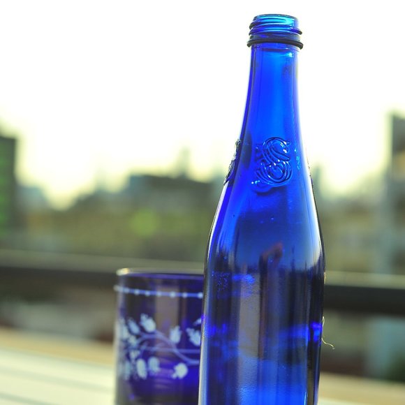 Exquisite Cobalt Blue Water Glass Bottle with Floral 3D Artwork - Picture 3 of 14